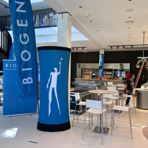 Advertising column, beach flag